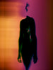 An abstract artwork by Myro Wulff featuring a blurred human figure in motion, with flowing shapes in shades of black, pink, and orange. The image has a dreamlike quality, evoking a sense of energy, transformation, and fluidity. Graduate Artist and Graduate Artworks by The Graduate Gallery.