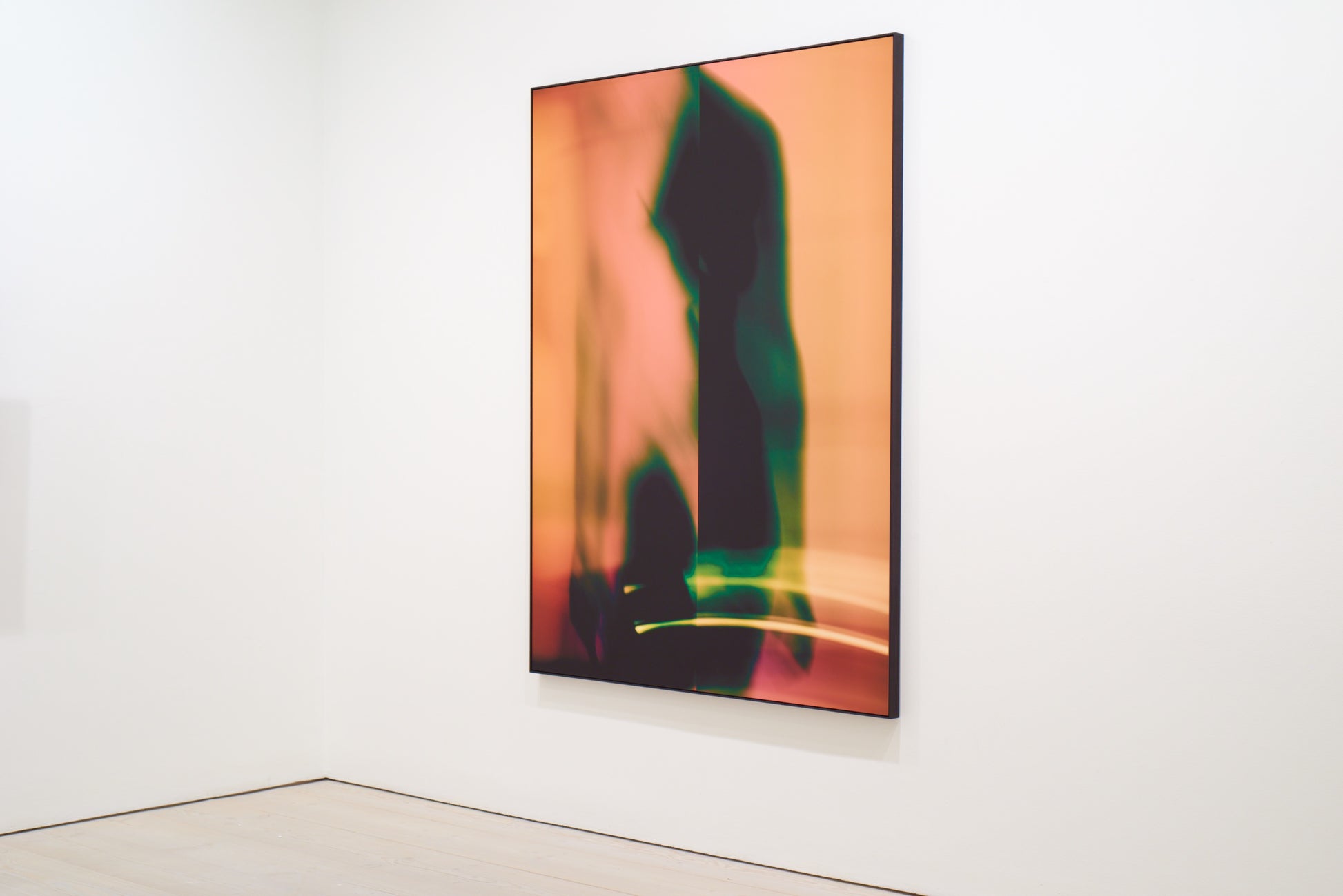 An abstract artwork by Myro Wulff featuring a blurred human figure in motion, with flowing shapes in shades of black, green, blue, and orange. The image has a dreamlike quality, evoking a sense of energy, transformation, and fluidity. Graduate Artist and Graduate Artworks by The Graduate Gallery.