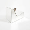 Discover a modern chair with a minimalist design, featuring a reflective mirror surface. Its angular shape creates a geometric aesthetic, set against a plain white background. This stunning piece of furniture is available for sale by The Graduate Gallery.