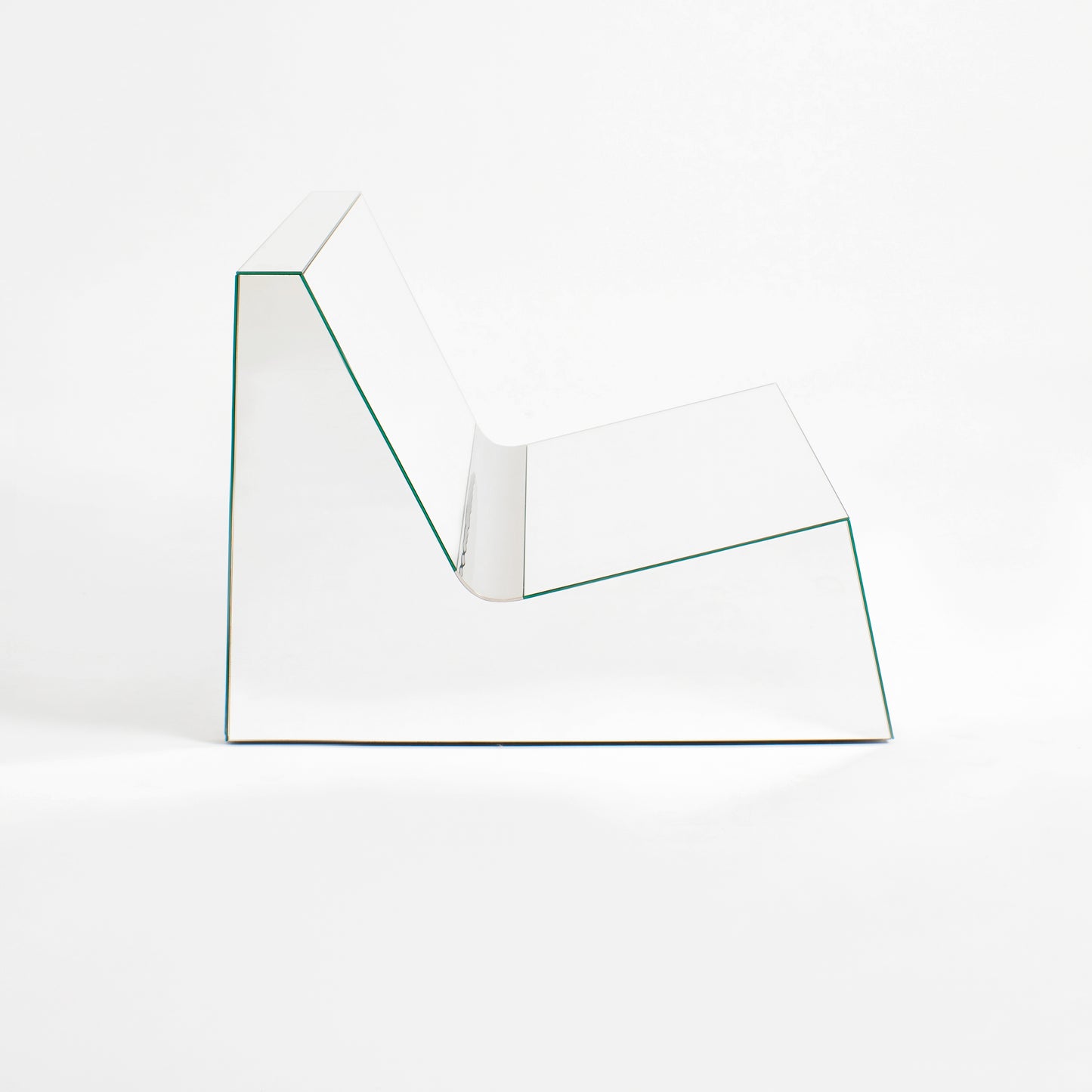 Discover a modern chair with a minimalist design, featuring a reflective mirror surface. Its angular shape creates a geometric aesthetic, set against a plain white background. This stunning piece of furniture is available for sale by The Graduate Gallery.