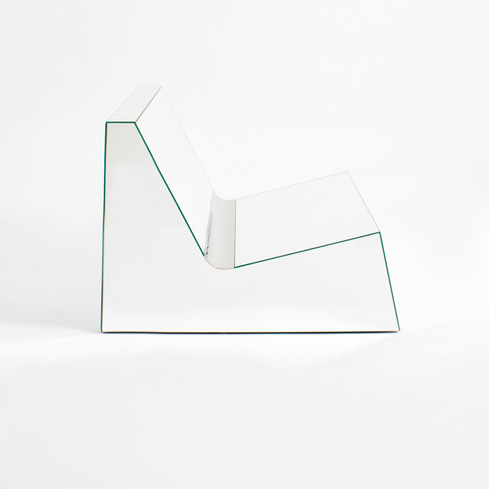 Discover a modern chair with a minimalist design, featuring a reflective mirror surface. Its angular shape creates a geometric aesthetic, set against a plain white background. This stunning piece of furniture is available for sale by The Graduate Gallery.