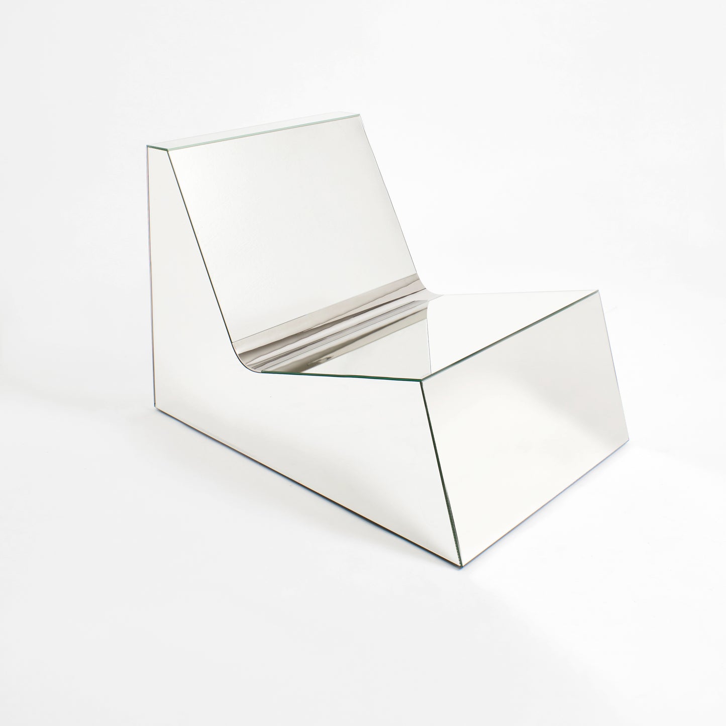 Discover a modern chair with a minimalist design, featuring a reflective mirror surface. Its angular shape creates a geometric aesthetic, set against a plain white background. This stunning piece of furniture is available for sale by The Graduate Gallery.