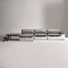 A modern, metallic couch from Project 213A a European design house launched in 2021, boasts a shiny silver finish and angular design.