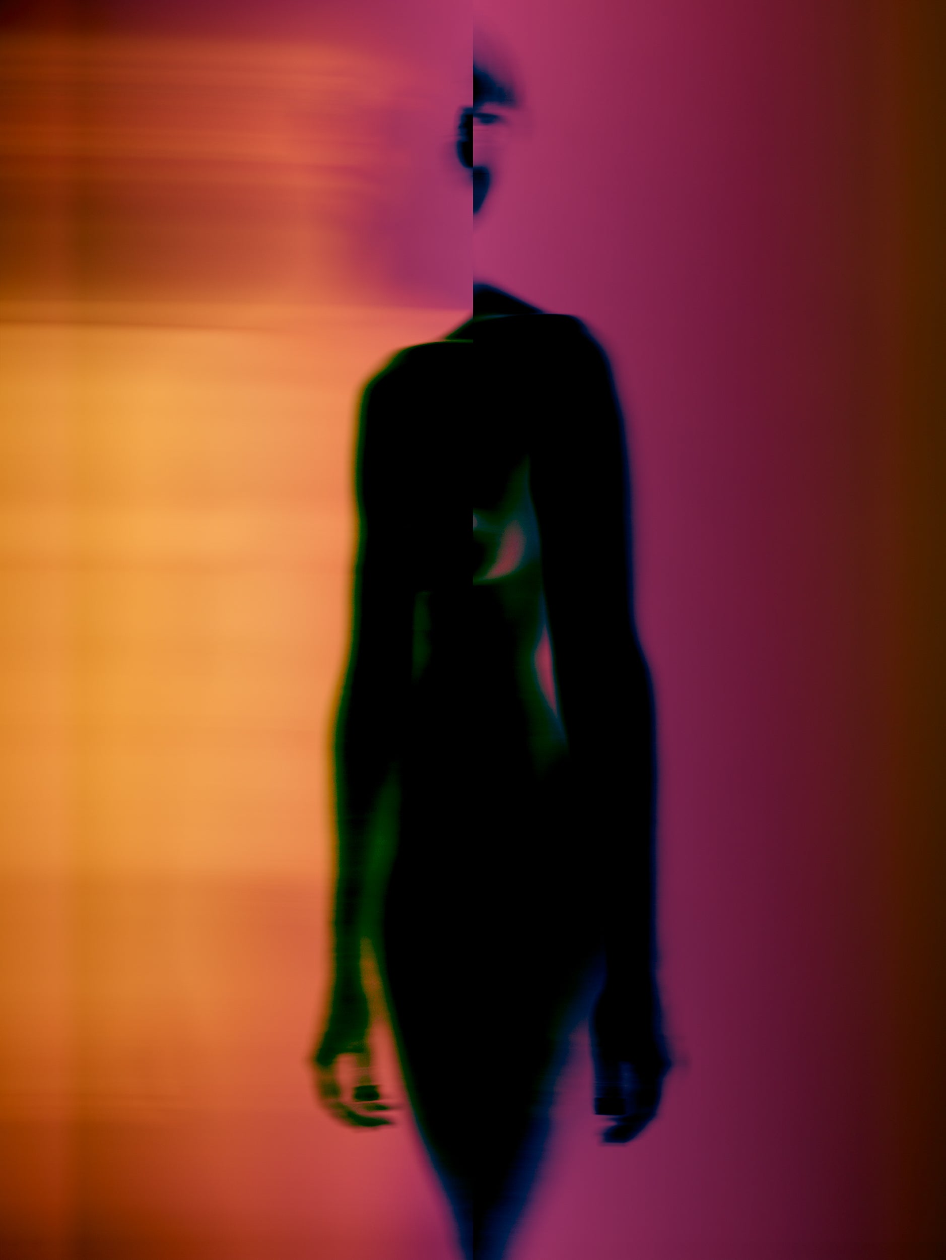 An abstract artwork by Myro Wulff featuring a blurred human figure in motion, with flowing shapes in shades of black, pink, and orange. The image has a dreamlike quality, evoking a sense of energy, transformation, and fluidity. Graduate Artist and Graduate Artworks by The Graduate Gallery.