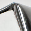 A modern, metallic couch from Project 213A a European design house launched in 2021, boasts a shiny silver finish and angular design. 
