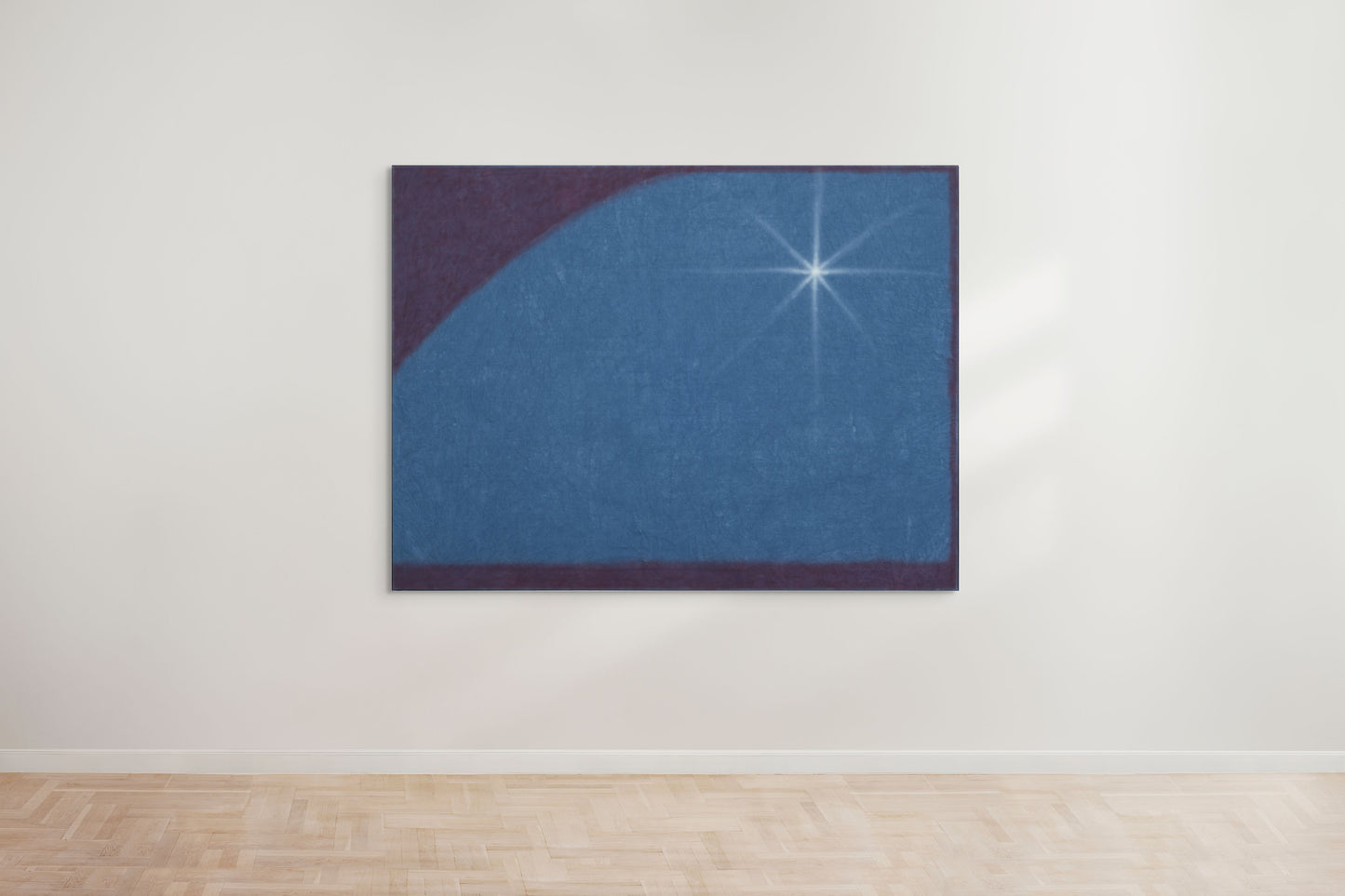 Work by young graduate Isabel Mills, a talented graduate artist in the UK showcases a blue textured background with a dark purple curve on the top left. A bright, white starburst commands attention on the right, echoing pieces available for sale at The Graduate Gallery.